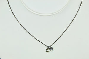 Hematite colored chain necklace w/pave CZ moon and solid star charms