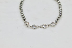 Stainless steel bead stretch bracelet with CZ detail