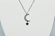 Load image into Gallery viewer, Hematite colored chain with CZ moon and hanging solid star