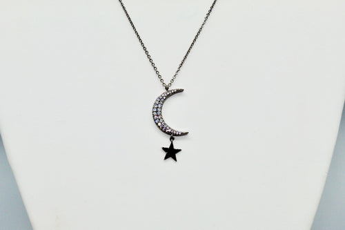 Hematite colored chain with CZ moon and hanging solid star