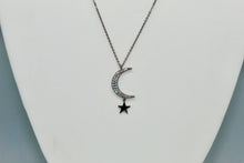 Load image into Gallery viewer, Hematite colored chain with CZ moon and hanging solid star