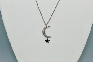 Hematite colored chain with CZ moon and hanging solid star