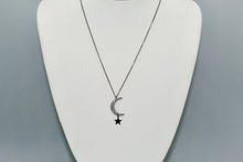 Load image into Gallery viewer, Hematite colored chain with CZ moon and hanging solid star